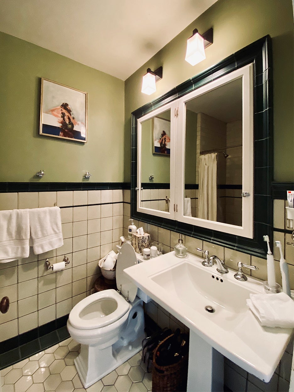 green and white dated bathroom