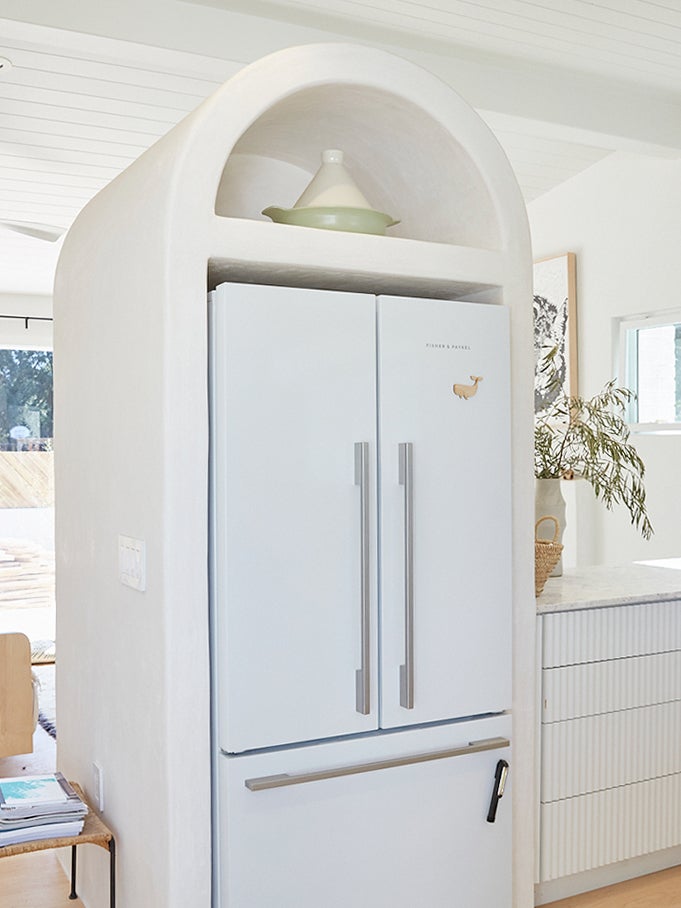 fridge inside arch hole