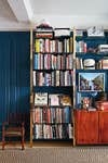 blue walls with bookshelf