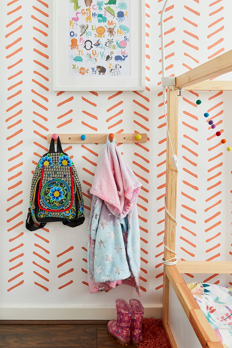 kids backpack hanging on wall