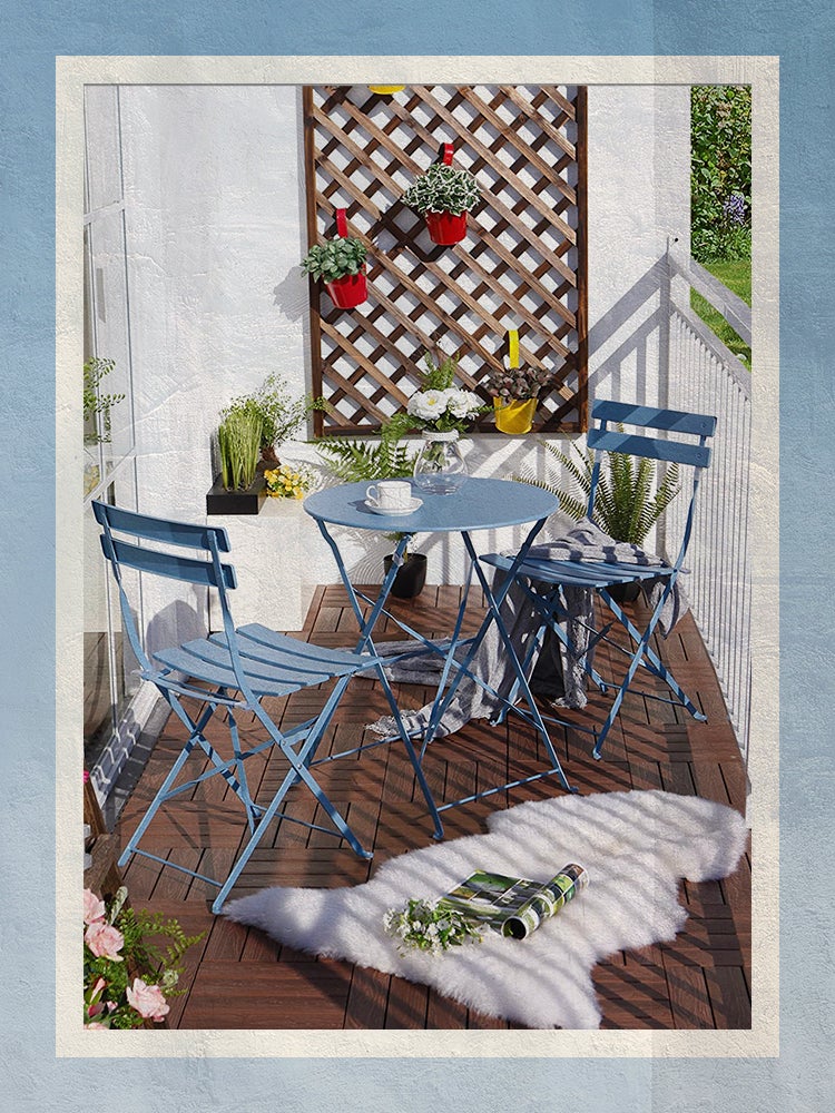 Best patio accessories - Balcony with blue patio set