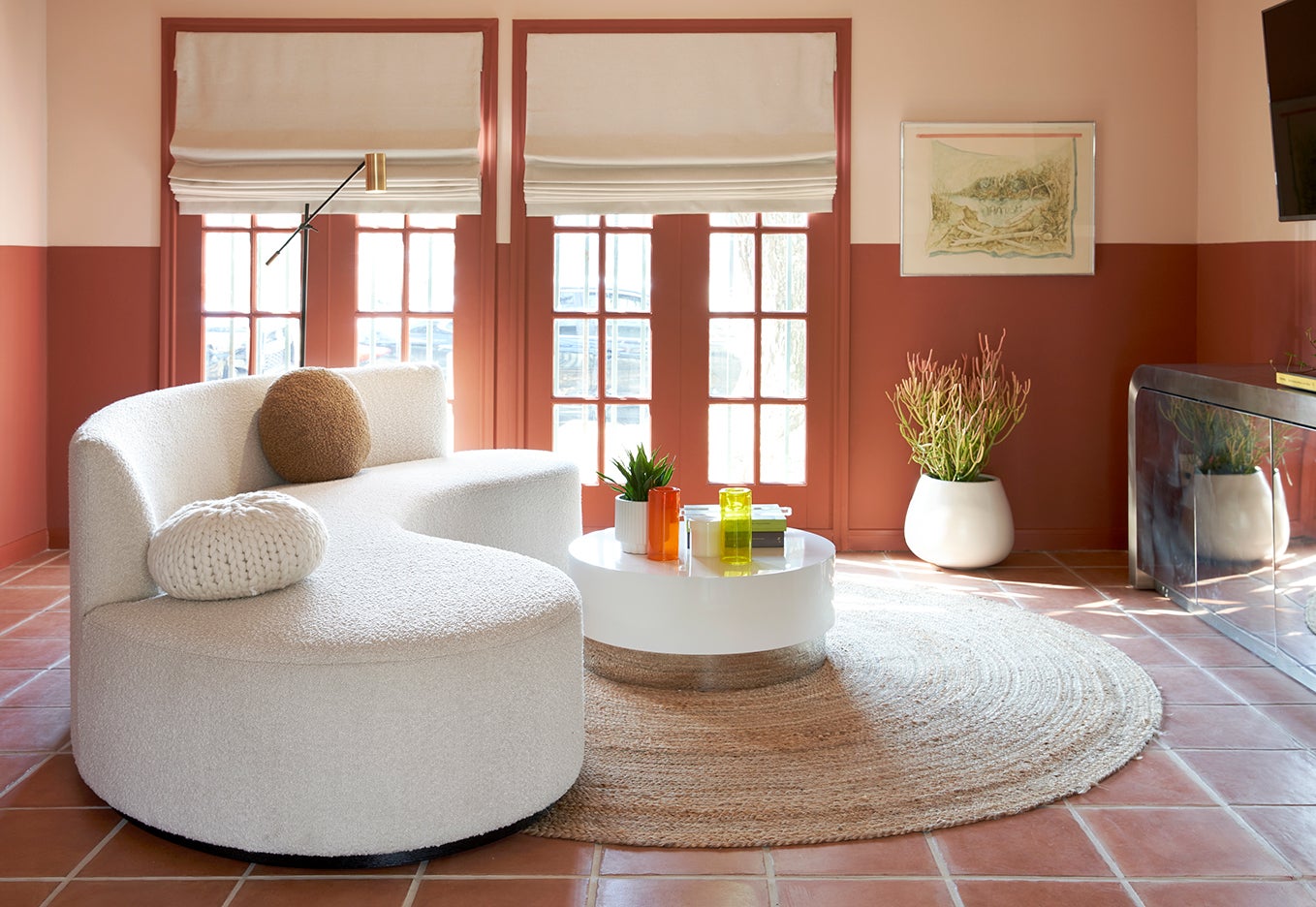 living room with terracotta half wall and trim