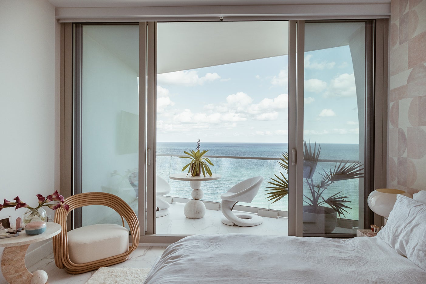 view from bedroom to balcony facing ocean