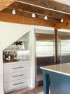 gray kitchen with slanted bar cabinet nook