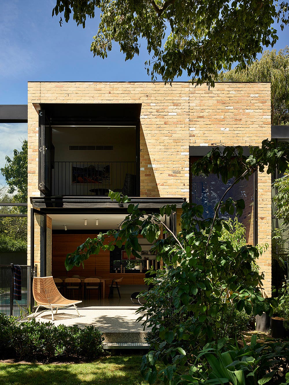 modern brick home with big windows