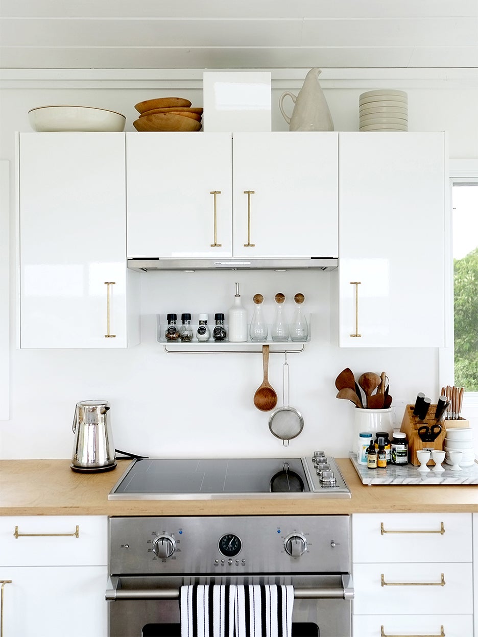 White kitchen cabinets and coffee maker