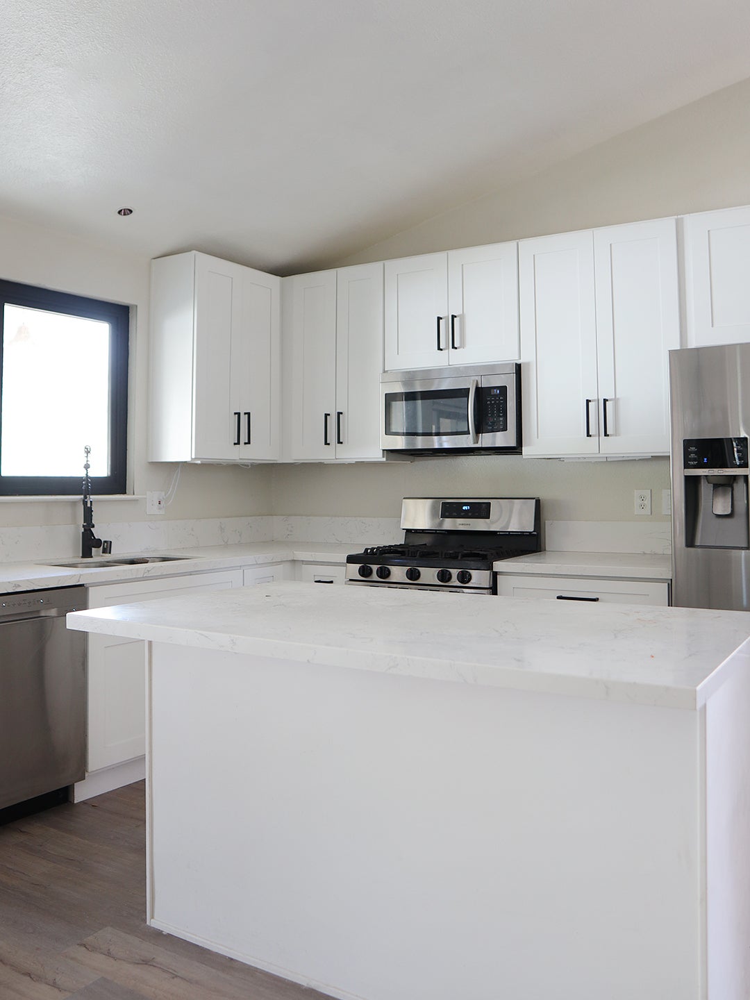 plain white builder-grade kitchen
