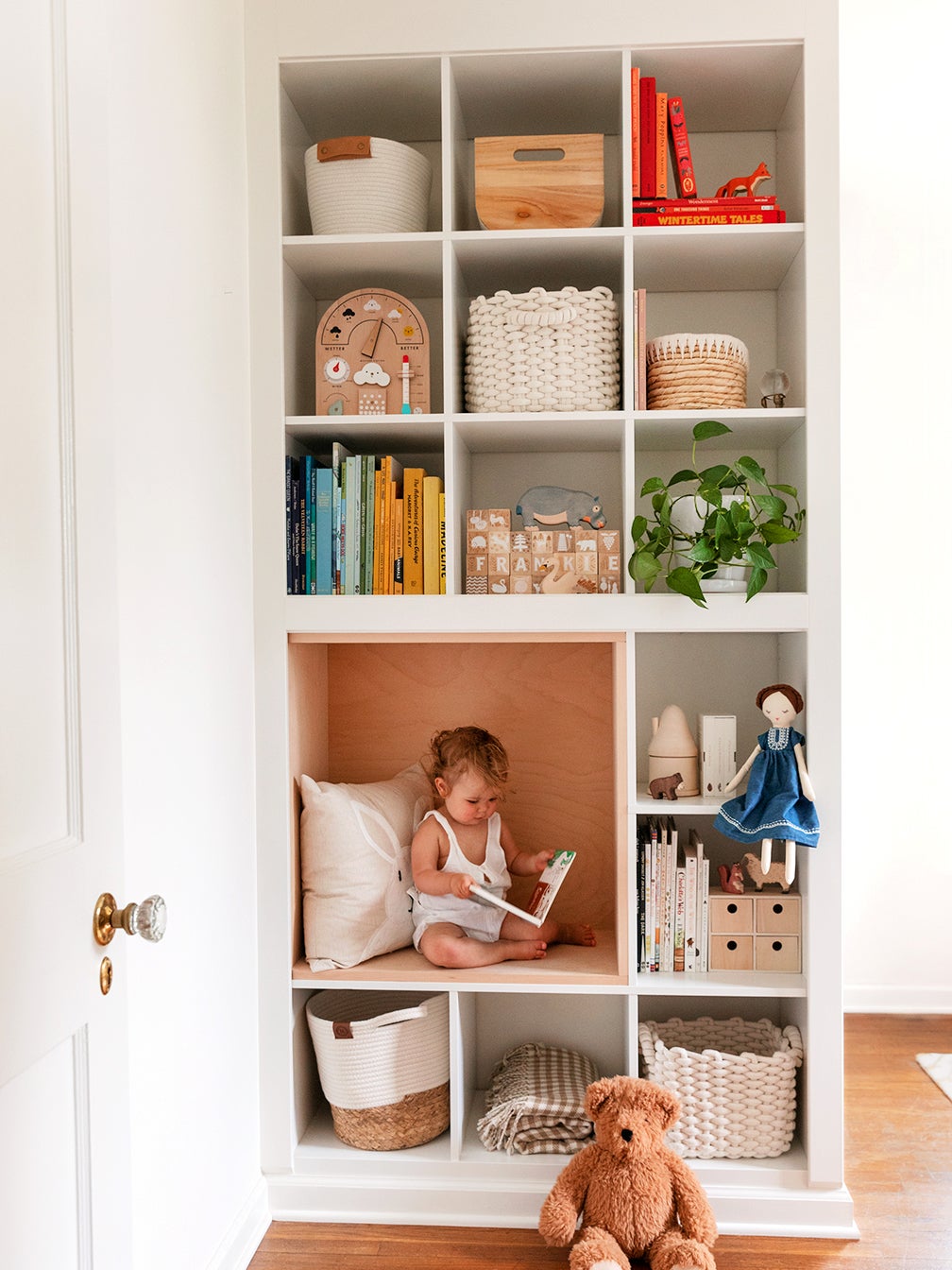 baby in reading nook