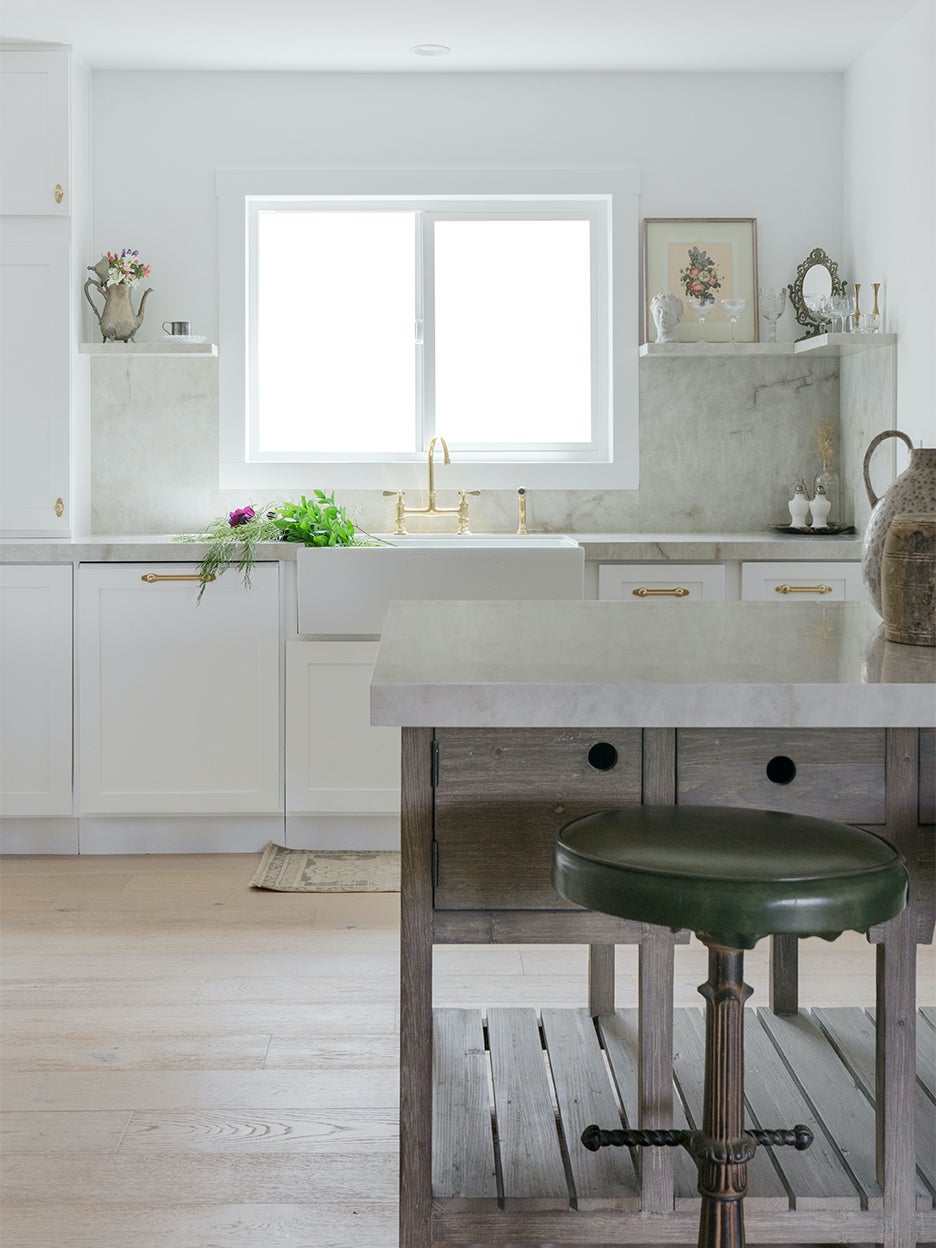 Clean white kitchen with porcelain countertops