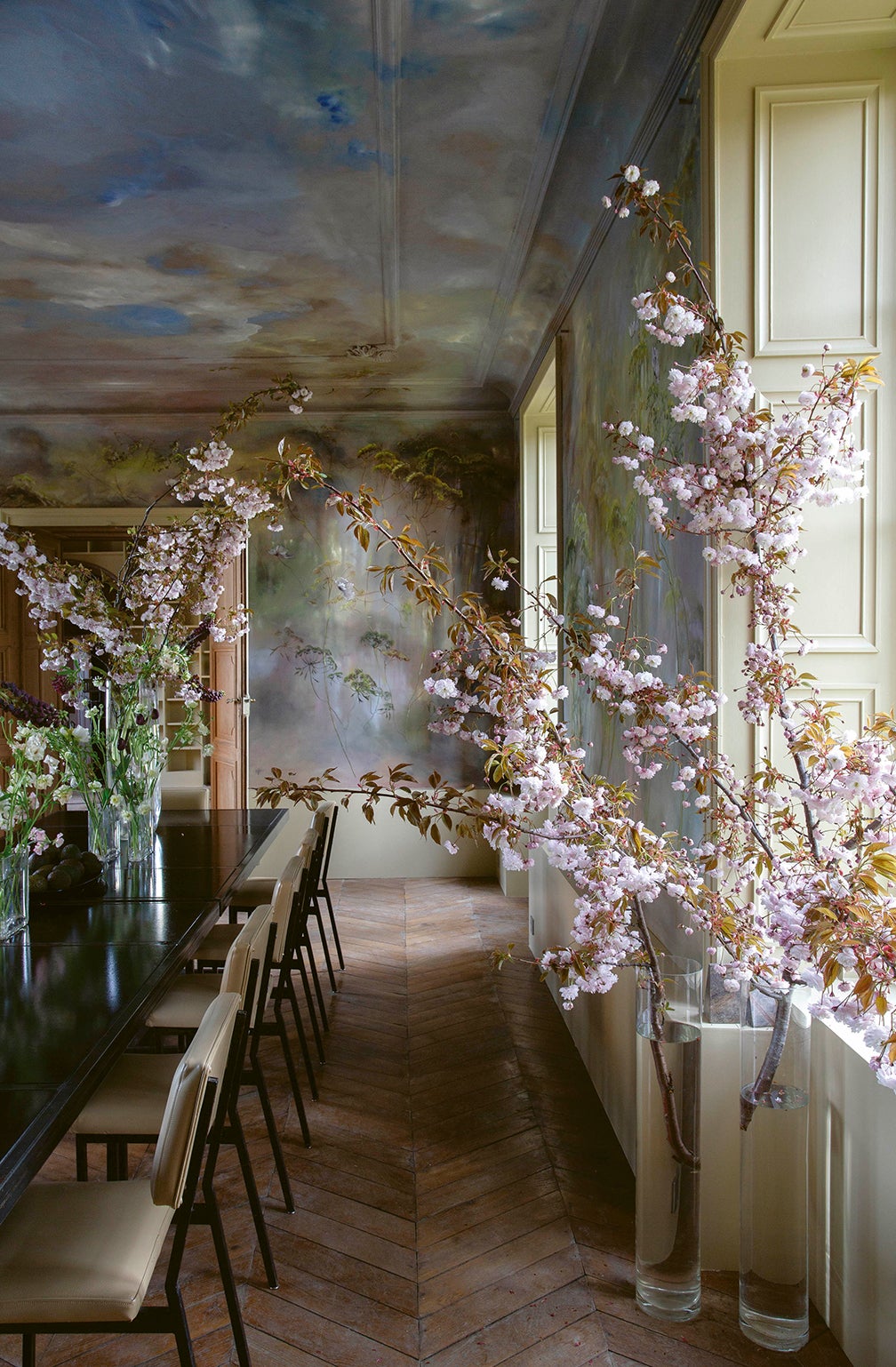 Dining room with painted mural and ceiling