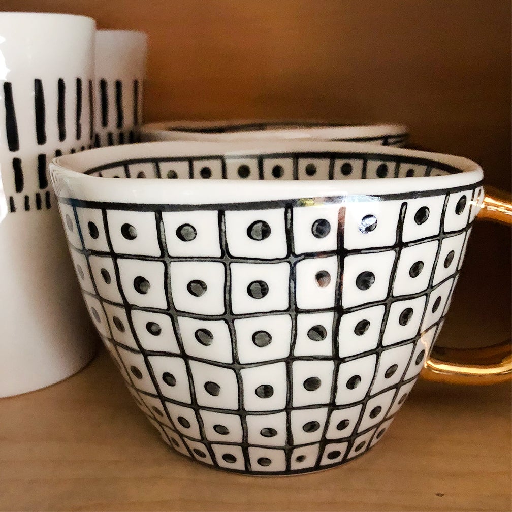 Black and white tea cup