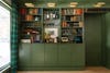 green bookcase wall