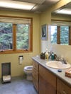 dated yellow bathroom before renovation