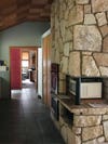 stone fireplace with microwave inset