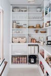 white kitchen pantry with drawers