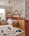 boys room with red wallpaper