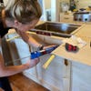 woman building kitchen island frame