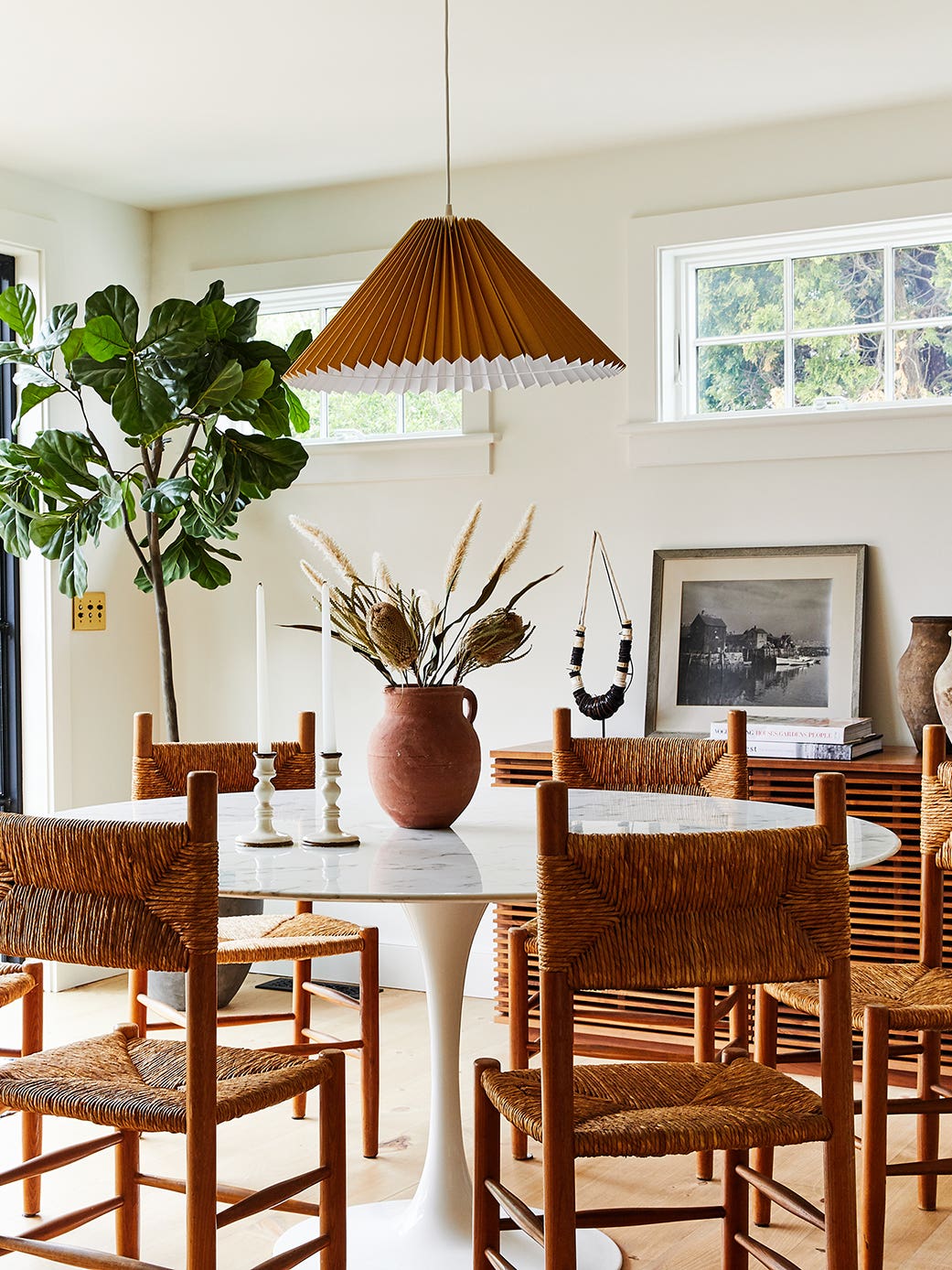 dining room with woven chairs