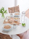 Muji products on a round white dining table