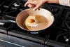 Material frying pan with egg