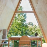 A-frame office with view of trees