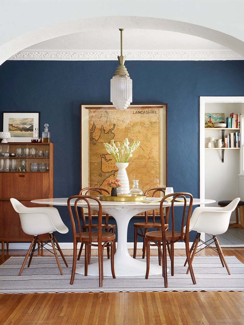 blue dining room with arch
