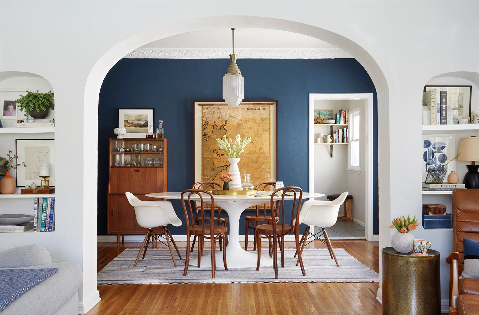 blue dining room with arch