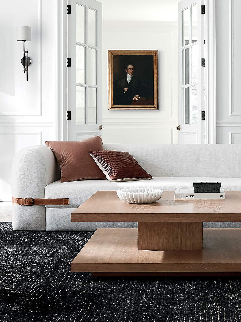 wood table in front of white sofa