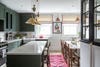 green kitchen with banquette