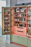 pink and green cabinet open