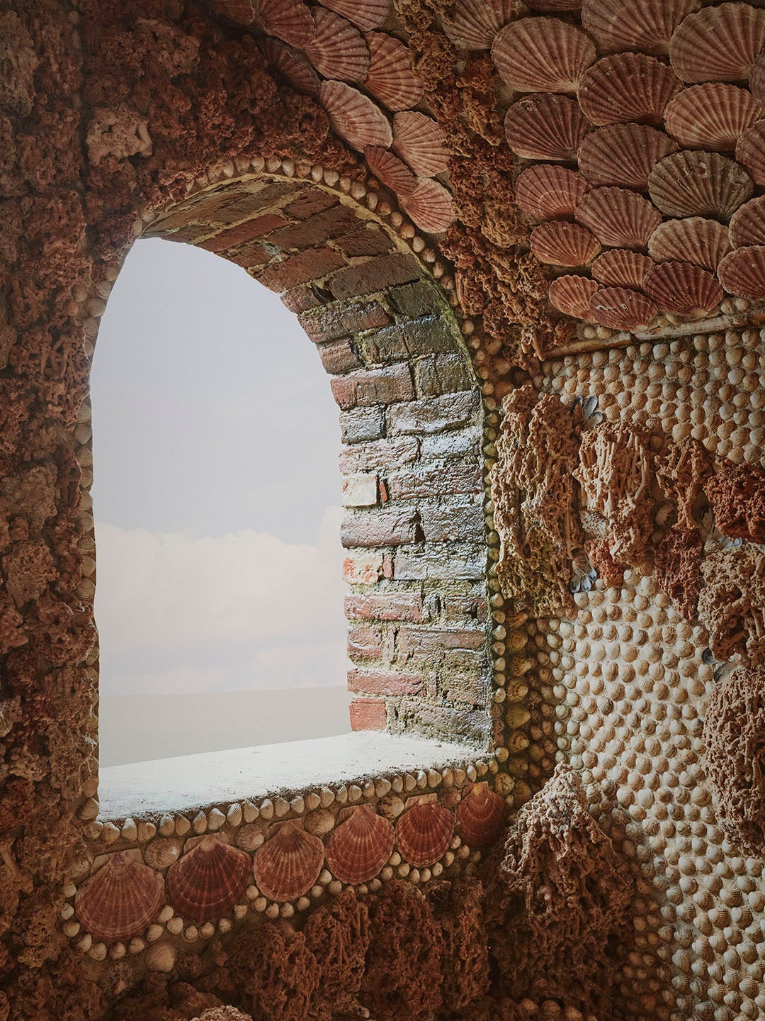 arched window with shellwork