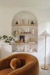 arched built in stocked with books