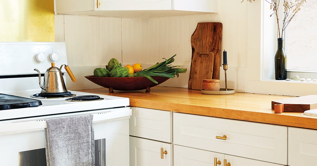 When It Comes to Upper-Corner Kitchen Cabinet Organization, a Pro Swears by  This Tool