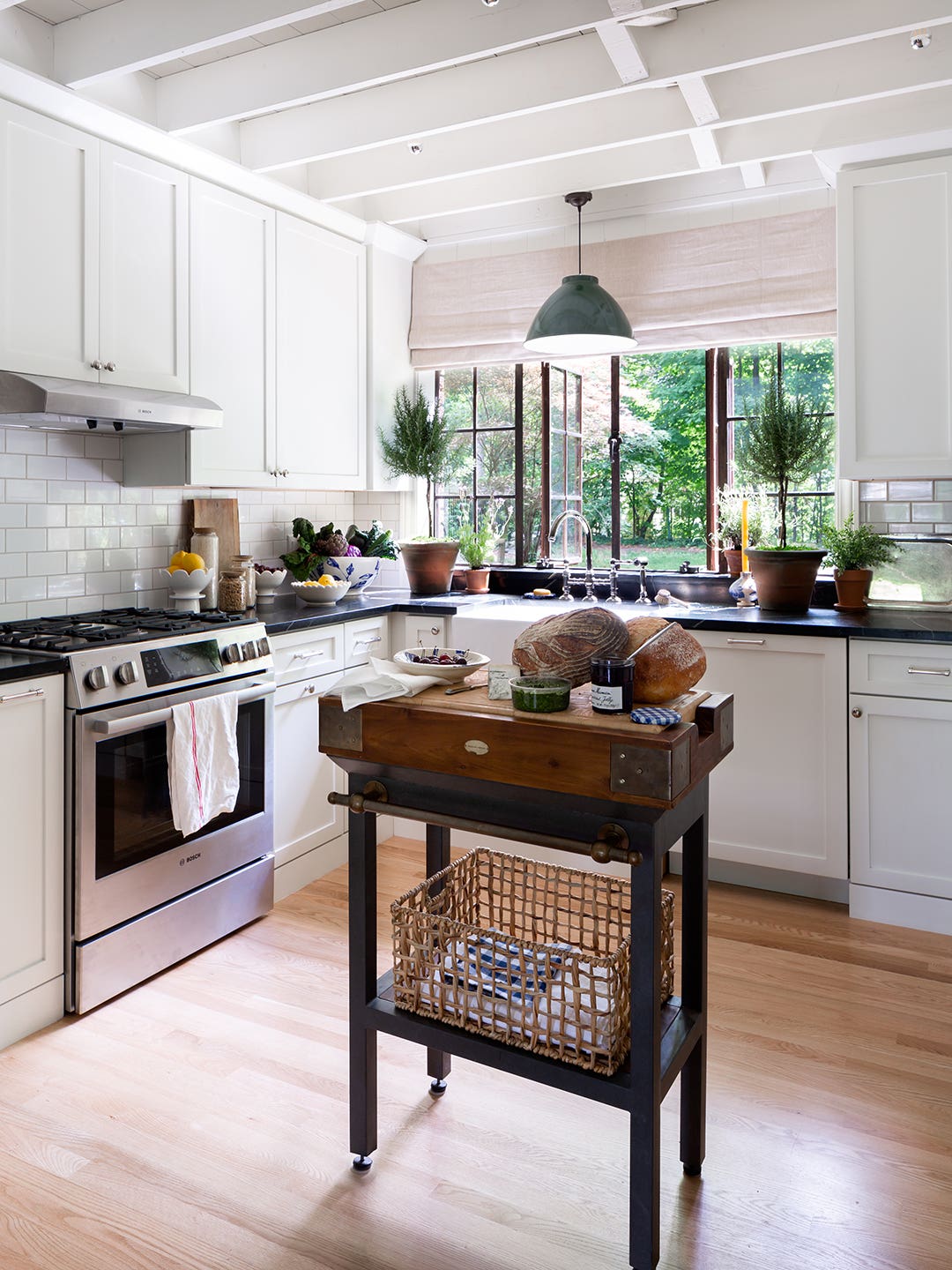 English Cottage Kitchen White Cabinets and Subway Tile