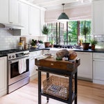 English Cottage Kitchen White Cabinets and Subway Tile