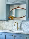 marble countertop in sky blue kitchen