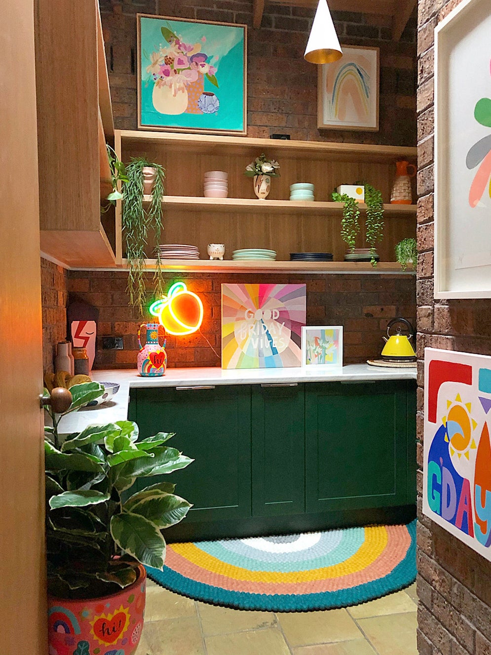 colorful walk-in pantry with art
