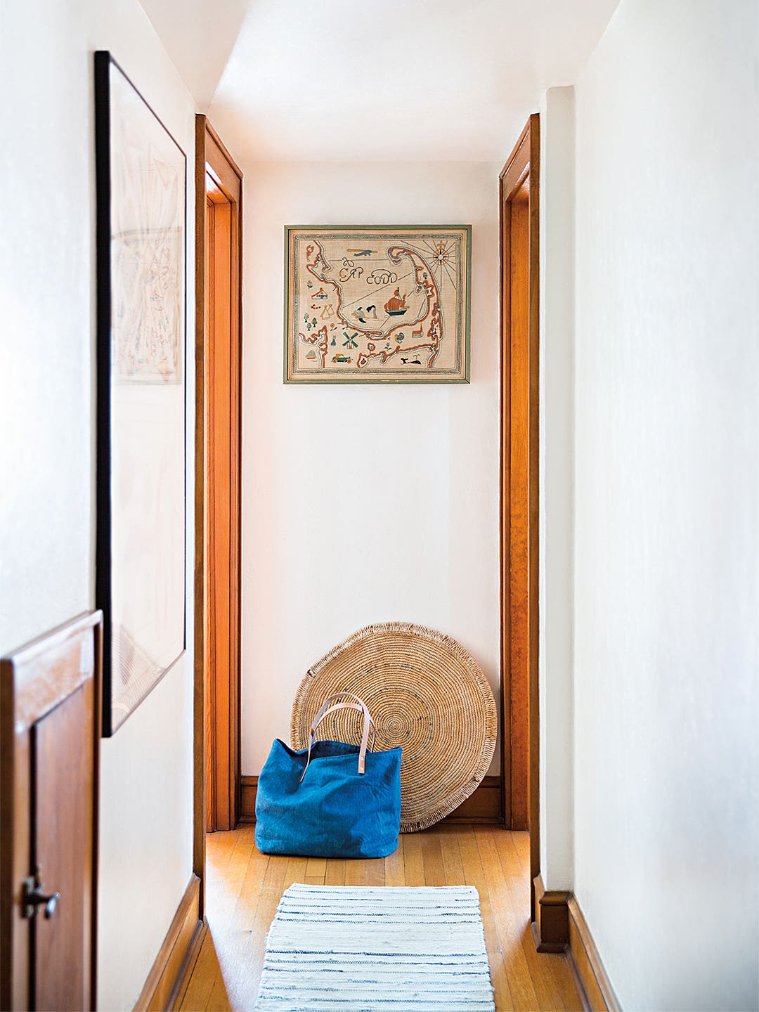 hallway with bag on floro at end