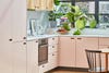 pink and wood kitchen cabinets