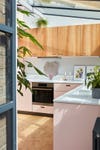 pink and wood kitchen