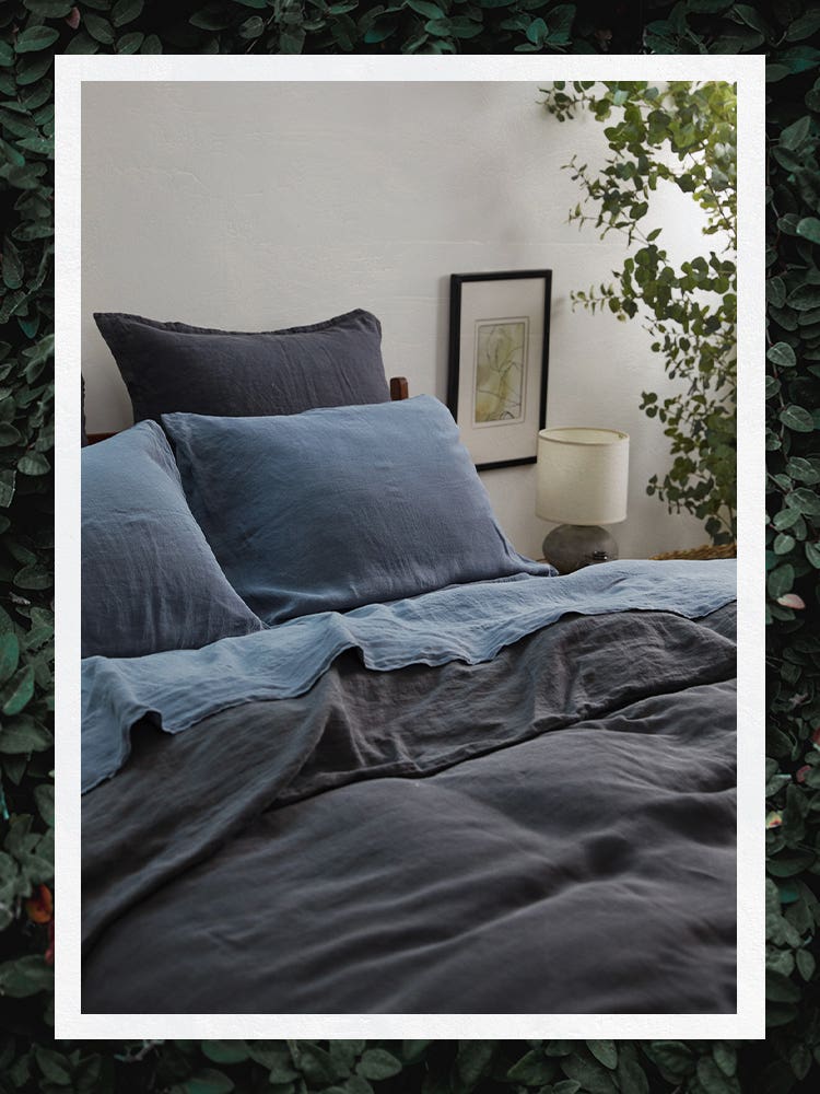Blue Sheets on Messily Made Bed