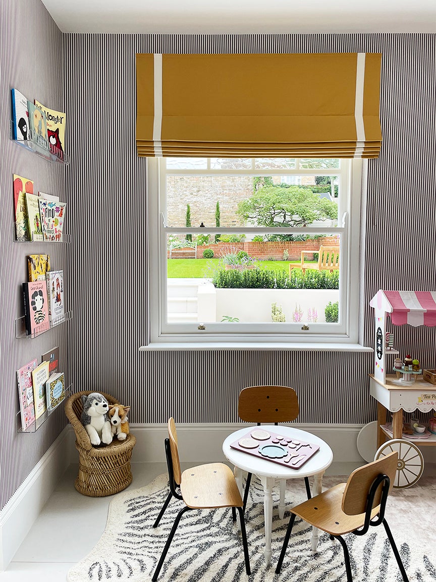 kids room, small chairs and yellow curtains
