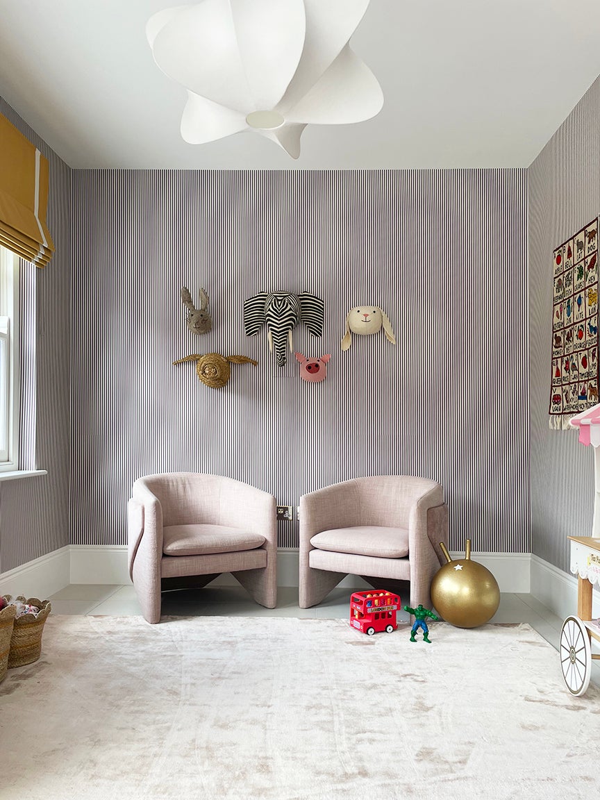 kids bedroom, pale pink chairs and striped wallpaper