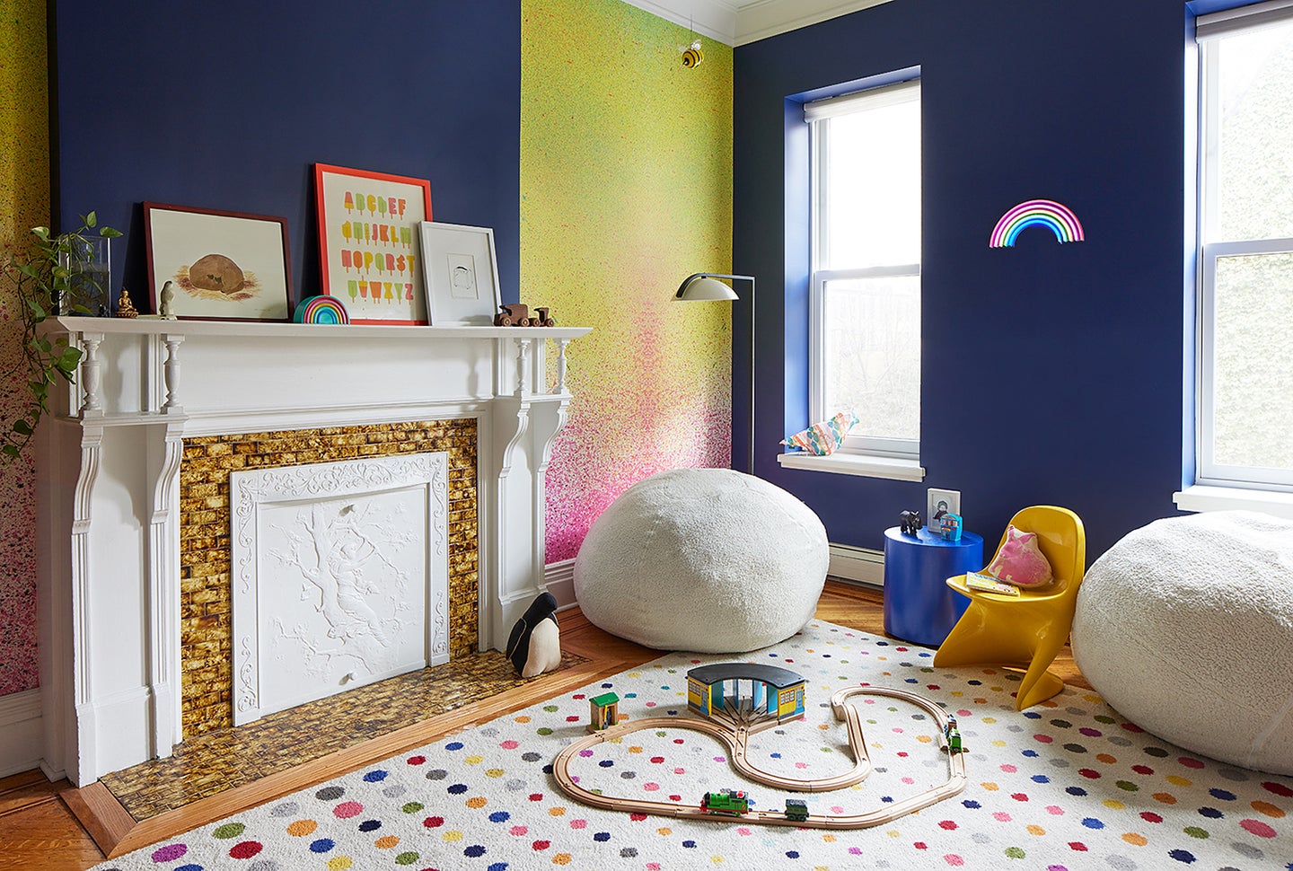 kids room, blue walls, rugs with colorful dots
