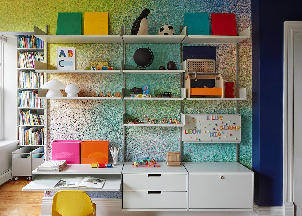 rainbow wall with white floating shelves