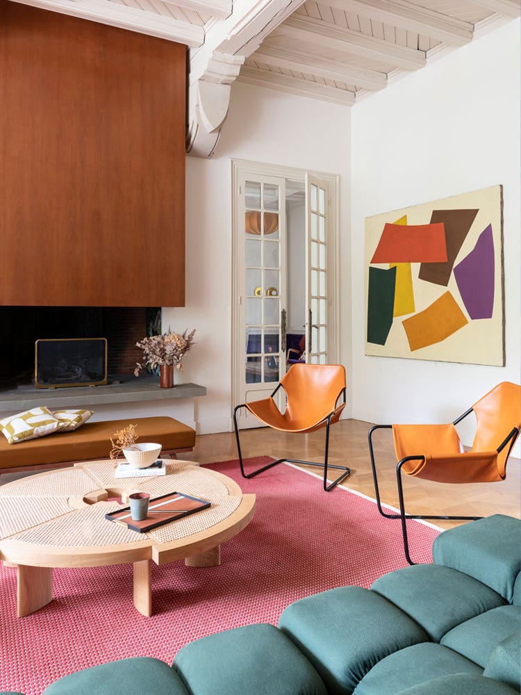 Napoleonic Architecture and Mid-Century Furniture Meet Head-On in This French Home
