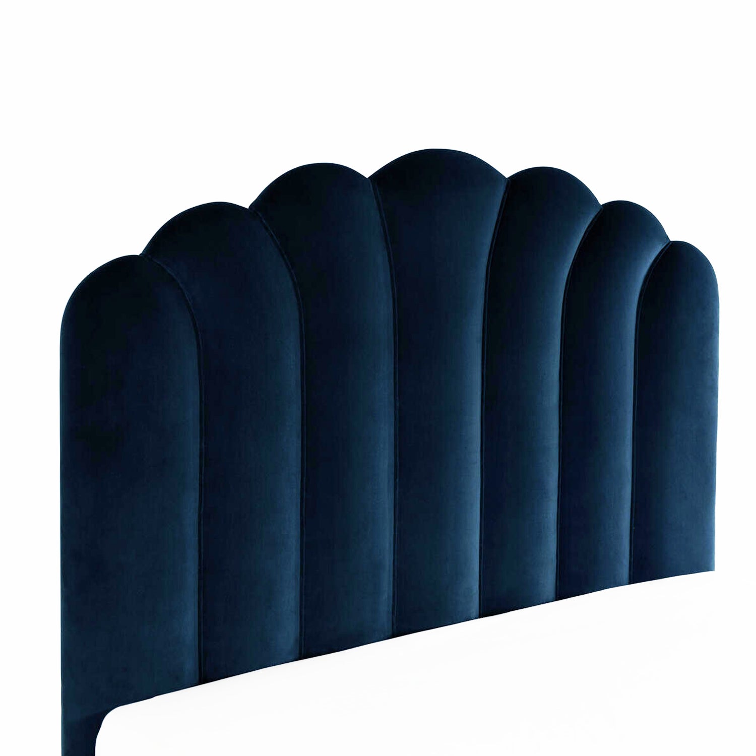 channel-tufted blue velvet headboard