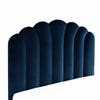 channel-tufted blue velvet headboard