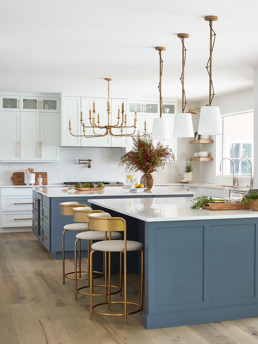 Blue Island in White Kitchen by HW Interiors Phot