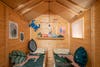 wooden bunkhouse with kids beds